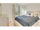 Comfortable bedroom with neutral decor, soft carpet, and abundant natural light at 1535 Barberry Dr, Kissimmee, FL 34744