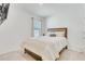 Well-lit bedroom with neutral carpet and decor, promoting a serene and relaxing atmosphere at 1535 Barberry Dr, Kissimmee, FL 34744
