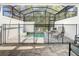 Private screened pool area with lounge chairs and safety fence at 17230 Blessing Dr, Clermont, FL 34714