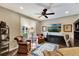 Comfortable living room with plush seating, a ceiling fan, and a view of the outdoors at 1767 Piedmont Pl, Lake Mary, FL 32746