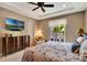 Inviting main bedroom with a ceiling fan and a private balcony at 1767 Piedmont Pl, Lake Mary, FL 32746