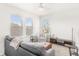 The beautiful loft area is filled with sunlight, and features neutral paint and carpet at 17985 Adrift Rd, Winter Garden, FL 34787
