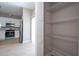 Spacious walk-in pantry with wire shelving located off a modern kitchen with stainless appliances at 2041 Warrens Ave, Maitland, FL 32751