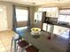Spacious kitchen featuring a breakfast bar, stainless steel appliances, and white cabinetry perfect for cooking at 213 S Lake Pleasant Rd, Apopka, FL 32703