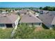Aerial view of the house with a large backyard, surrounded by other homes in the community at 2312 Rose Blvd, Winter Haven, FL 33881