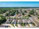 Areal view showcasing a well-planned community with single-Gathering homes and lush greenery at 2312 Rose Blvd, Winter Haven, FL 33881