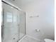 Bathroom featuring a glass-enclosed shower, tile flooring, and neutral walls at 2312 Rose Blvd, Winter Haven, FL 33881