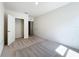 Bedroom featuring neutral carpet, access to a closet and bathroom at 2312 Rose Blvd, Winter Haven, FL 33881