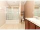 Bathroom featuring tile floors, a vanity with a sink, and a shower/tub combination with sliding glass doors at 2530 San Jacinto Cir # 2530, Sanford, FL 32771