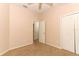 Bedroom featuring carpet flooring, ceiling fan, and closet for optimal storage at 2530 San Jacinto Cir # 2530, Sanford, FL 32771