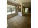 Open concept room featuring carpet, large window with natural light at 2530 San Jacinto Cir # 2530, Sanford, FL 32771