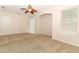 Spacious living room with fan and sliding doors at 2530 San Jacinto Cir # 2530, Sanford, FL 32771