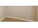 Textured wall with neutral-colored paint and a light-colored baseboard, showcasing a simple and clean aesthetic at 2530 San Jacinto Cir # 2530, Sanford, FL 32771