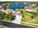 Stunning aerial view of a lovely home with a large lake, showcasing its prime location at 2704 Gorst Rd, Winter Garden, FL 34787