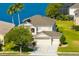 Beautiful aerial view showcasing the home's manicured lawn and well-maintained exterior at 2704 Gorst Rd, Winter Garden, FL 34787
