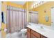 Bathroom featuring a vanity with a white countertop, shower curtain, and tiled floor at 2704 Gorst Rd, Winter Garden, FL 34787