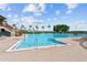 Large pool area featuring an additional pool and comfortable lounge chairs at 2704 Gorst Rd, Winter Garden, FL 34787