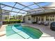 Beautiful screened-in pool and patio area, creating an ideal outdoor living space at 2704 Gorst Rd, Winter Garden, FL 34787