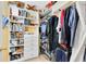 Walk-in closet featuring shelving and organizational space for clothing storage at 2704 Gorst Rd, Winter Garden, FL 34787