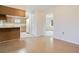 View of kitchen with white appliances and eat-in counter at 36208 Micro Racetrack Rd, Fruitland Park, FL 34731