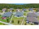 Great aerial view showing the well-maintained lawn, and backyard at 4296 Mirror Ct, Clermont, FL 34714
