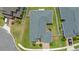 High angle aerial showing roof, lawn, and garden at 4296 Mirror Ct, Clermont, FL 34714