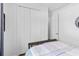 This bedroom has a closet with folding doors, plus a secondary door at 4296 Mirror Ct, Clermont, FL 34714