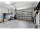 Spacious two-car garage, featuring ample storage space and an automatic door opener at 4296 Mirror Ct, Clermont, FL 34714