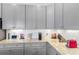 Modern kitchen with granite counters, stainless steel appliances, and ample counter space at 4296 Mirror Ct, Clermont, FL 34714
