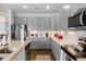 Well-equipped kitchen featuring stainless appliances, plenty of cabinetry and counter space at 4296 Mirror Ct, Clermont, FL 34714
