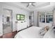 A spacious main bedroom with an ensuite bath and a window at 4296 Mirror Ct, Clermont, FL 34714