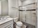 Modern bathroom with a glass shower, vanity sink, and tiled floors, designed for comfort at 4336 Foggy Oak Ln, Sanford, FL 32773