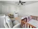 Comfortable Bedroom with crib, play area, chair, and dresser in a clean, organized space at 4336 Foggy Oak Ln, Sanford, FL 32773