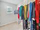 Spacious walk-in closet features hanging storage, and a sunny window at 4336 Foggy Oak Ln, Sanford, FL 32773