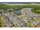 Community view of the neighborhood, including homes and a nearby lake at 4350 Verde Valley Ln, Kissimmee, FL 34746