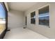 Covered patio with an open view of the backyard and nearby pond at 4350 Verde Valley Ln, Kissimmee, FL 34746