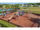 Community playground offers a safe place for children to play with a slide and climbing structure at 4350 Verde Valley Ln, Kissimmee, FL 34746