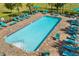 View of the pool and patio with ample seating at the community center at 4350 Verde Valley Ln, Kissimmee, FL 34746