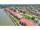 Waterfront condominiums provide red tiled roofs, convenient parking, manicured landscaping and incredible access to coastal waterways at 446 Bouchelle Dr # 103, New Smyrna Beach, FL 32169