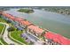 Waterfront condos with terracotta roofs, parking, and easy boat access at 446 Bouchelle Dr # 103, New Smyrna Beach, FL 32169