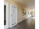 Ground floor condo entrance with welcome mat and neutral decor at 446 Bouchelle Dr # 103, New Smyrna Beach, FL 32169
