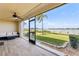 A screened lanai with gorgeous views of the waterfront at 446 Bouchelle Dr # 103, New Smyrna Beach, FL 32169