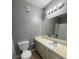 Bathroom with a classic vanity and ample countertop space at 4772 Walden Cir # 228, Orlando, FL 32811