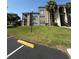 A charming condo building with well-maintained landscaping and convenient parking at 4772 Walden Cir # 228, Orlando, FL 32811