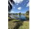 Scenic view of pond with water fountain feature at 4772 Walden Cir # 228, Orlando, FL 32811