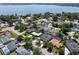 Panoramic aerial showcasing the homes in a lakeside community, perfect for enjoying a tranquil and scenic lifestyle at 5100 La Croix Ave, Belle Isle, FL 32812