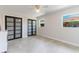 Bright bedroom featuring dual closets, neutral color palette, and ample natural light at 5100 La Croix Ave, Belle Isle, FL 32812