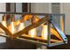 Close up of the modern rustic chandelier with exposed bulbs at 5100 La Croix Ave, Belle Isle, FL 32812