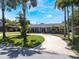 Lovely single-story home featuring a well-maintained lawn and inviting circular driveway at 5100 La Croix Ave, Belle Isle, FL 32812