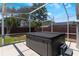 Enjoy the luxury of a private, screened-in hot tub for relaxation and recreation at 5100 La Croix Ave, Belle Isle, FL 32812